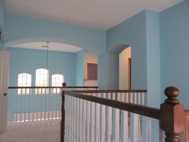 Blue Upstairs Hallway Interior Painting project photo in Houston Area, TX