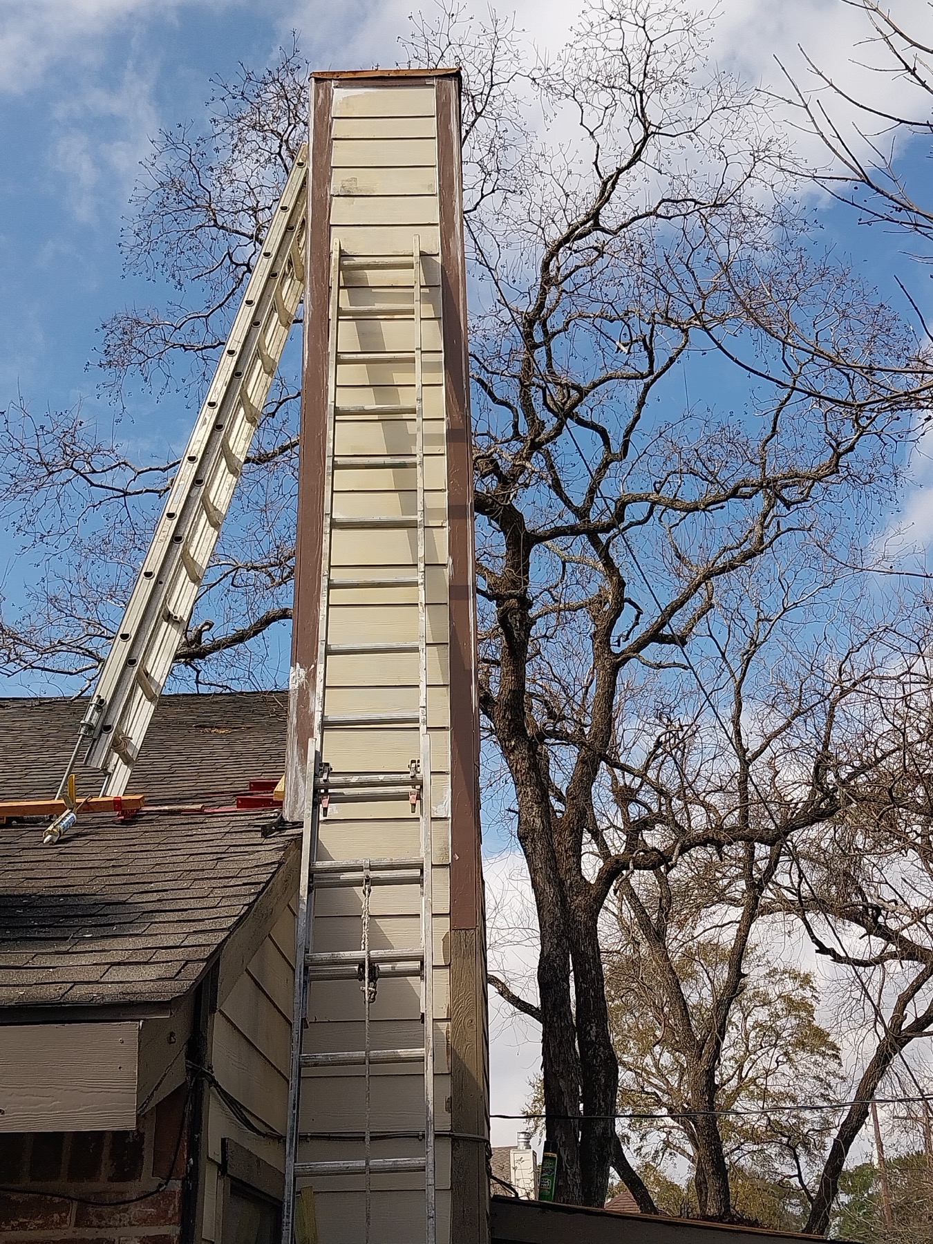 Exterior Chimney Trim Prep project photo in Houston Area, TX