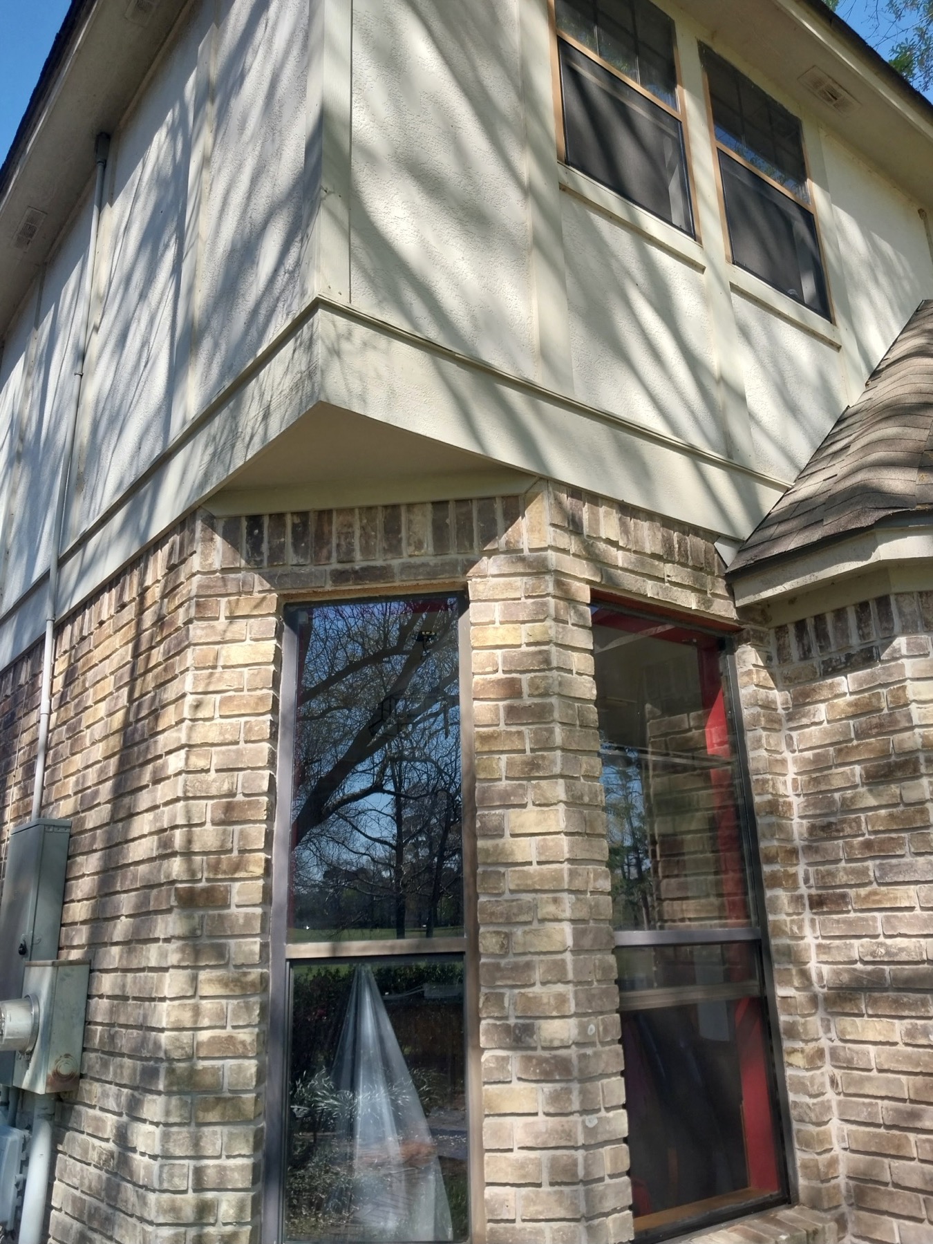Exterior Window Trim and Siding Prep project photo in Houston Area, TX