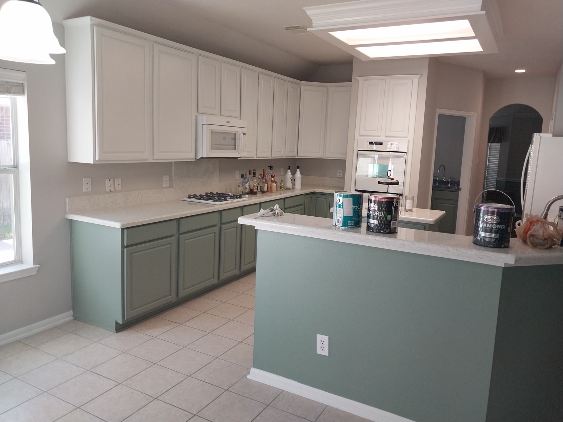 Kitchen Cabinet and Island Finish project photo in Houston Area, TX