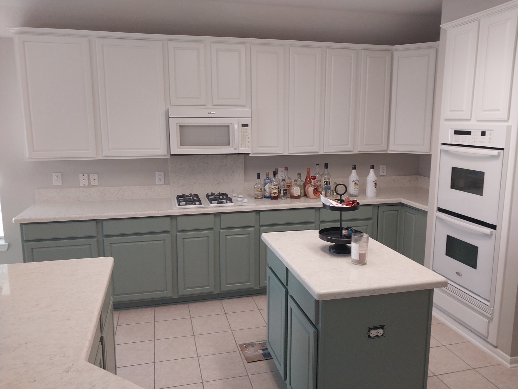 Two-Tone Kitchen Cabinet Painting project photo in Houston Area, TX